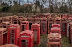 graveyard of red telephone boxes in Carlton Miniott