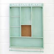For those with a fluid decor style (or very little floor space we'd love the look of this whitewashed pinewood shelf on an exposed brick wall. Lakeside Wall Hanging Jewelry Organizer With Live Laugh Love Sentiment Target