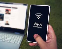 Laptop and smartphone connected to WiFiの画像
