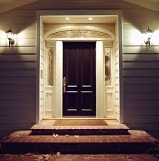 Front Door Of House With Lights At Night Main Door Design Front Door Lighting Door Design