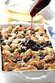 Blueberry And Cream Cheese French Toast Casserole With Blueberry Sauce Breakfast Breakfast Brunch Recipes Stuffed French Toast Cream Cheese