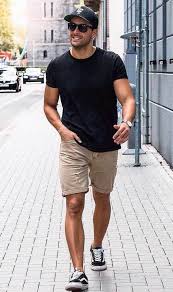 Summer Style Men With A Black T Shirt And Khaki Shorts In 2020 Summer Outfits Men Mens Casual Outfits Summer Mens Casual Outfits