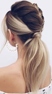 Braids hairstyle 2021 features wavy hair with two side braid ponytail hairstyles that meet in the middle. These Ponytail Hairstyles Will Take Your Hairstyle To The Next Level Braided And Ponytail