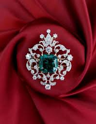 emerald green brooch