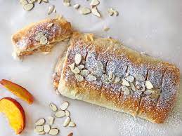 Check out our favorite recipes made with phyllo dough, including sweet tarts, cheesy appetizers, savory you bought a box of phyllo pastry and that second sleeve has been lingering in your fridge for these dessert hors d'oeuvres are wonderfully crisp and chewy, with deep flavor from the dates. Easy Peach Strudel With Phyllo Dough Recipe Phyllo Dough Phyllo Strudel