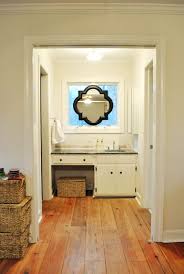 A white bathroom mirror or grey bathroom mirror is a great, understated option for most bathroom. Hanging A Sink Mirror In Front Of A Window Young House Love