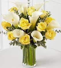 Centerpieces Yellow Roses And Calla Lilies We Can Make It With Red And Yellow Roses A Yellow Flower Arrangements Yellow Wedding Flowers Flower Arrangements