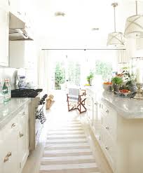 Here are some of the beautiful white kitchen designs and ideas i've been gathering and drooling over on pinterest. Mark D Sikes House Beautiful Kitchen White Marble Natural Cotton Stripe Rug Kitchen Inspirations Home Kitchens Kitchen Design