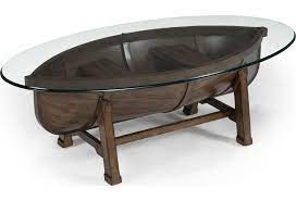From art & home's curated collection of wonderful coffee & cocktail tables. Magnussen Home Beaufort 200 12303 6 Boat Hull Cocktail Table With Trestle Base And Tempered Glass Top Furniture Fair North Carolina Cocktail Coffee Tables