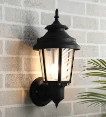 Highlight your doorway or outdoor space with our selection of outdoor wall lights, available in a variety of styles. Buy Exterior Black Metal Outdoor Wall Light By Superscape Outdoor Lighting Online Outdoor Wall Lights Outdoor Lights Lamps And Lighting Pepperfry Product