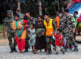 Nepal races to rescue hundreds of people trapped in hydroelectric tunnel.