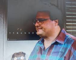 What is the movie about a guy with a cane cloning dinosaurs and needing  paleontologists to evaluate the park?