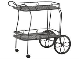 When cooking out, there never seems to be enough space for all the stuff that goes along with grilling. Woodard Wrought Iron Mesh Top Tea Serving Cart With Removable Serving Tray Wr880080