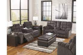The wood grain looking surface is safe and waterproof; Acieona Manual Reclining Sofa With Drop Down Table Ashley Furniture Homestore