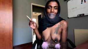Desi in hijab smoking while wearing nipple clamps