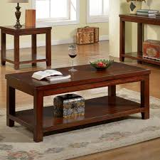 90cm long, 60cm wide, 28cm high. Copper Grove Bowron Dark Cherry Coffee Table
