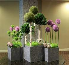The Park Fantasy Trees Of Allium Green Dianthus Pittosporum Moss Orbs Cast Sh Modern Flower Arrangements Unique Flower Arrangements Flower Arrangements