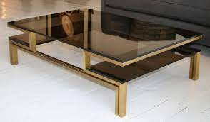 When paired with matching end tables and sofa tables , a coffee table ties your room together and gives your living room a unified look and feel. Coffee Table French Smoked Glass And Brass Tables Large Coffe Table Flat Square Dark Side Storage Light Brown Coffee Table Table Furniture Coffee Table Design