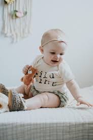This Darling Baby Is Wearing Our Natural Wild Thing Onesie Made From Organic Cotton M Organic Baby Bodysuit Gender Neutral Baby Clothes Organic Baby Clothes