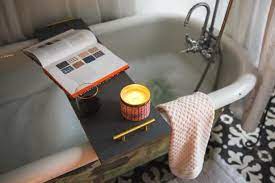 The bathtub tray is one of the few accessories you can add to this room. Diy Wooden Bath Tray Hgtv