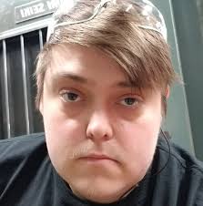 When to switch a male corgi from puppy food to adult food?