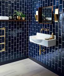 The smaller tiles mixed in among larger marble this stunning dark bathroom has so many features we want to call out. Metro Deep Blue Tile Bathroom Inspiration Bathrooms Remodel Bathroom Design