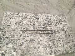 The tile shop presents this how to video that details the necessary steps for installing a linear shower drain. Problems With Shower Drain With Pebble Floor
