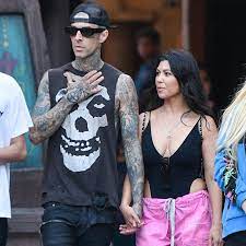 Barker posted a photo of the couple's hiking excursion, where the couple shared a kiss as they traversed over an iron. Kourtney Kardashian Travis Barker Make Out At Ufc 264 Match