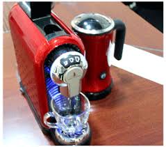 The thing about capsule coffee machines is they're usually made by the coffee capsule companies themselves. Nespresso Coffee Capsule Machine For Italy Market Nespresso Capsules Filling Sealing Machine Kcups Filling Sealing Machine Coffee Capsules Filling Sealing Machine