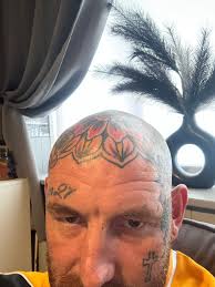 Image result for quirky pylon forehead tattoo