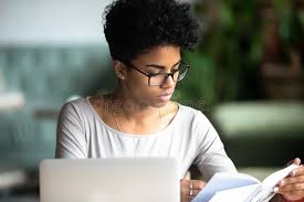 Select from premium ethnic background images of the highest quality. Concentrated African Beautiful Woman Studying Reading A Book Stock Photo Image Of Black College 139905826