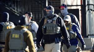 Denver bid to ban ICE, other officers from wearing face masks passes  committee