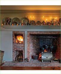 Wildly popular, warehouse or barn style doors have become a staple in many homes across america. Hugedomains Com Farmhouse Fireplace Colonial House Kitchen Fireplace