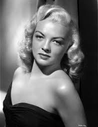 Adria Arjona as Madison in Hit Man. W t