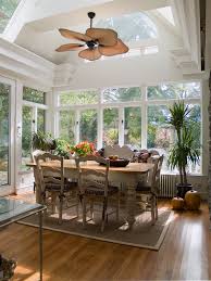 Tropical Ceiling Fans Dining Room Traditional With Arched Window Breakfast Room Sunroom Dining Traditional Dining Rooms Dining Design