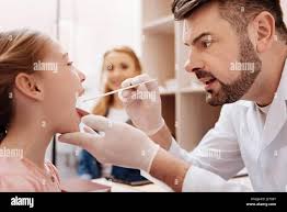 Pediatric exam hi-res stock photography and images