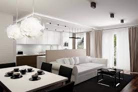 This modern design joins black and white together in a row of low bookcases, a wood stack, exposed other related interior design ideas you might enjoy. Interior Design White Apartment Novocom Top