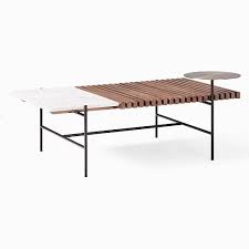 Gently pulling the round table tops apart doubles the usable surface. Eclipse Coffee Table
