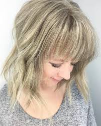 Here's a friendly tip—use dry shampoo to reinforce the volume and texture. 23 Chic Choppy Bangs For Women That Are Popular For 2021