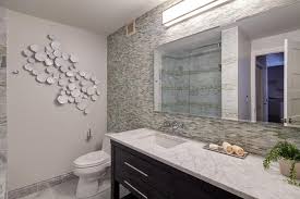 The look of this room is remarkable since it includes a ceramic tile accent wall. Contemporary Single Vanity Bathroom Features Glass Tile Accent Wall Hgtv