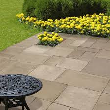 Installing landscape edging bricks is easy, but extensive labor is required, so you'll have to be committed and dedicated to the process if you want to enjoy the benefits. Wetcast Yorkstone Menards Patio Blocks Patio Backyard Landscaping