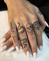 Finger Tattoos Tattoo Insider Hand Tattoos For Women Small Hand Tattoos Finger Tattoo For Women