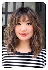 Wispy bangs are even cuter when they're curly. The 79 Sexiest Wispy Bangs To Inspire Your Makeover