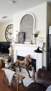The paint color of the gallery wall is glidden black mica. Fall Ing For Vintage And Modern Decor Black And White Living Room Bees N Burlap