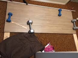 You can easily lay diy laminate floors in almost every room in your home, including kitchens, since it doesn't have to be glued down and doesn't involve grout or mortar. How To Build A Stylish Yet Cheap Diy Headboard Using Laminate Flooring Learn Along With Me
