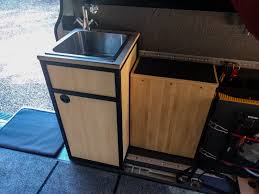 Toe skins cover the face of toe kick area on a cabinet run and make it look like a single cabinet unit was built. Sink Cabinet Built With 80 20 Aluminum Extrusion Sprinter Adventure Van