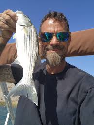 My husband got him a 24 lb channel cat not to bad. Fish head is as big as  his.