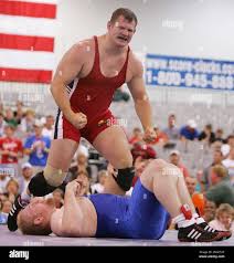 Tolly Thompson, top, of Cedar Falls, Iowa, reacts after pinning Steve Mocco,  of N. Bergen, N.J., in their 120kg freestyle finals match at the 2005 U.S.  National Wrestling Championships at The Las