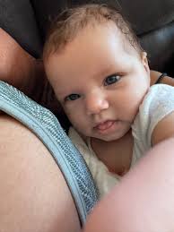 her eyes have just gotten brighter since birth & have just been blue. dad  has bright blue eyes & i have light/medium brown. she is biracial (1/4  african american). experiences? thoughts? hoping