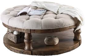 I love the idea of using a large tufted ottoman as a coffee table. Amstel Farmhouse Tufted Coffee Table Antique Oak Decorist